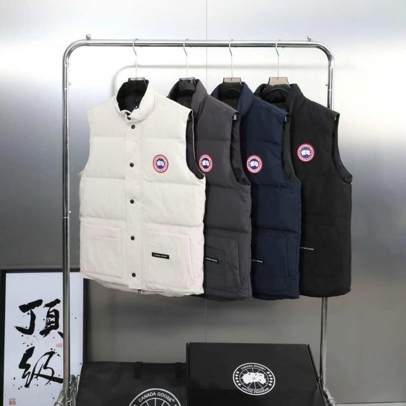 Can*a Go*e down vest