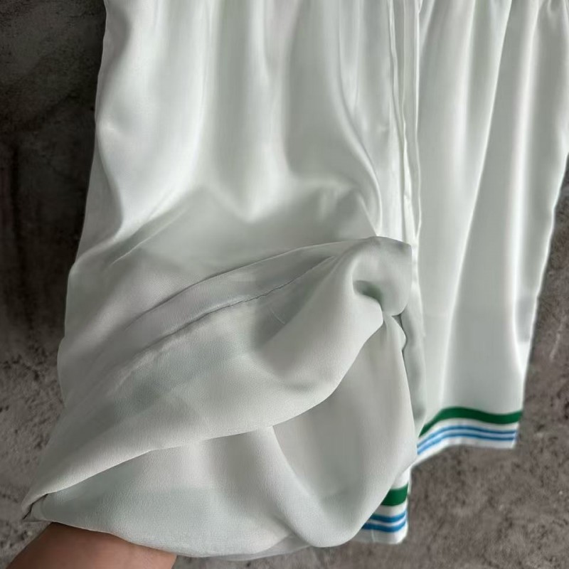 CASABLANCA Colorful portrait pattern silk white shorts