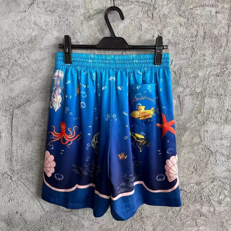 CASABLANCA Blue silk shorts with marine animal print