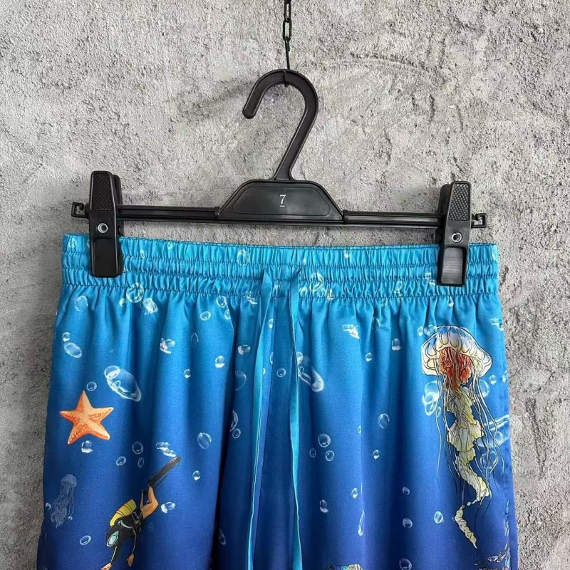 CASABLANCA Blue silk shorts with marine animal print