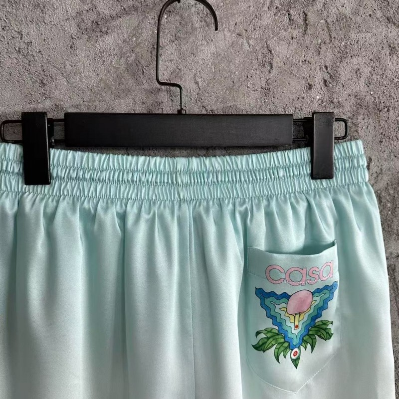 CASABLANCA Light blue silk shorts with ripple pattern