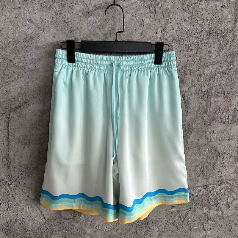 CASABLANCA Light blue silk shorts with ripple pattern