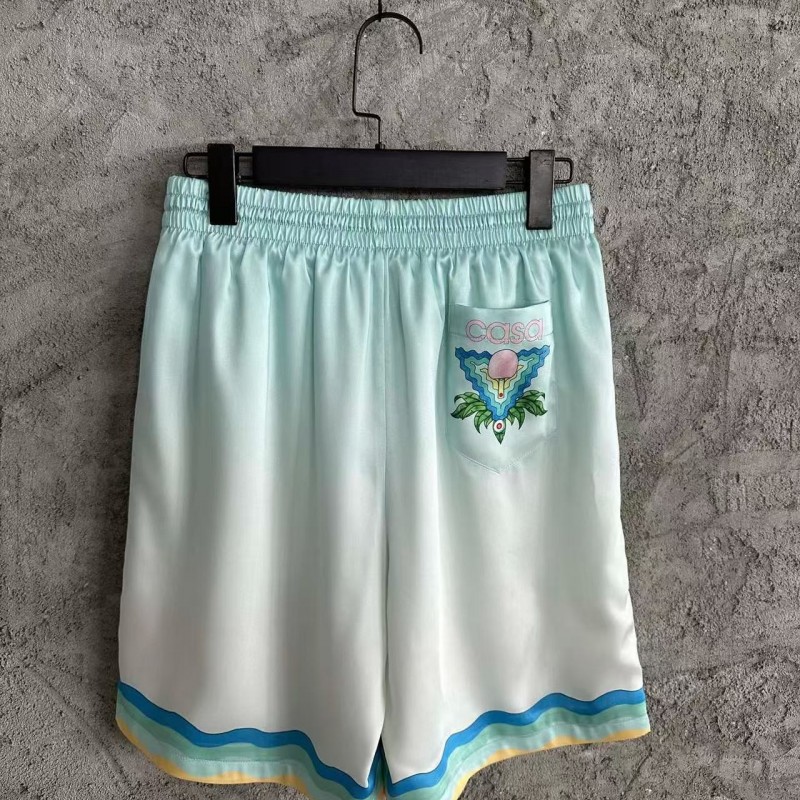 CASABLANCA Light blue silk shorts with ripple pattern