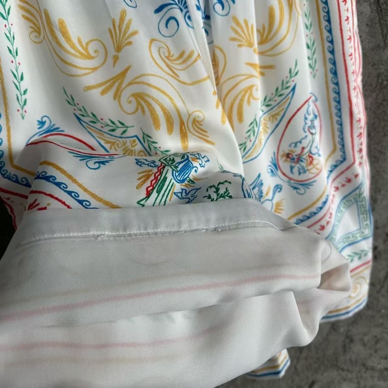 CASABLANCA White linen shorts with totem pattern