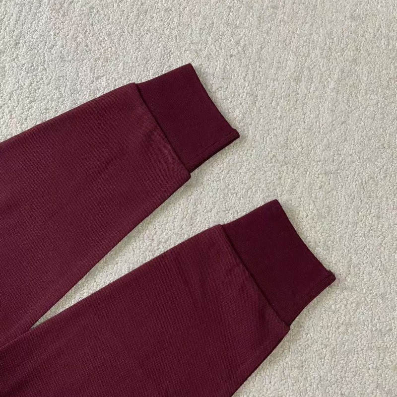 M*um*u red polo shirt