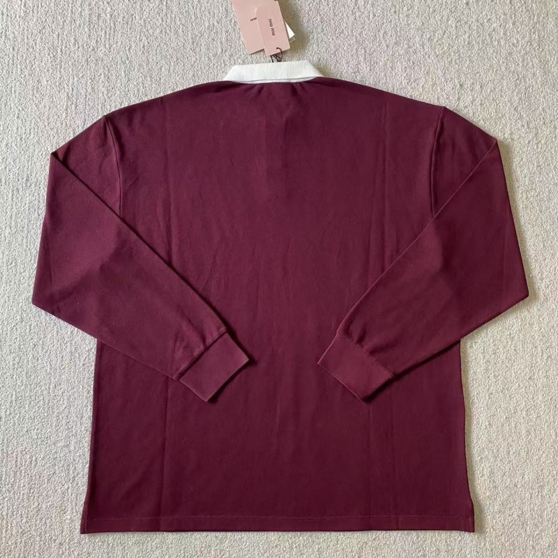 M*um*u red polo shirt