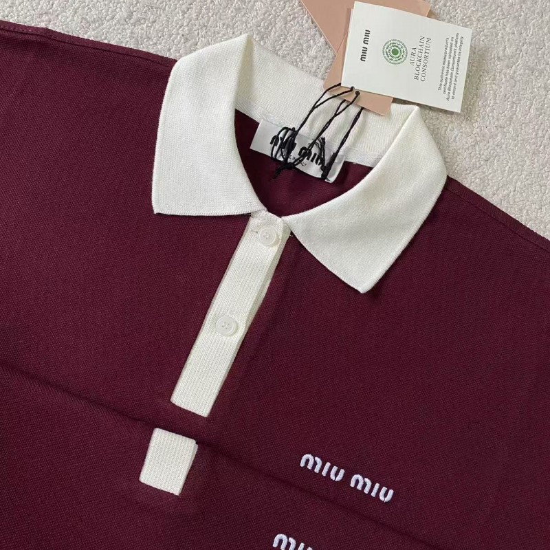 M*um*u red polo shirt