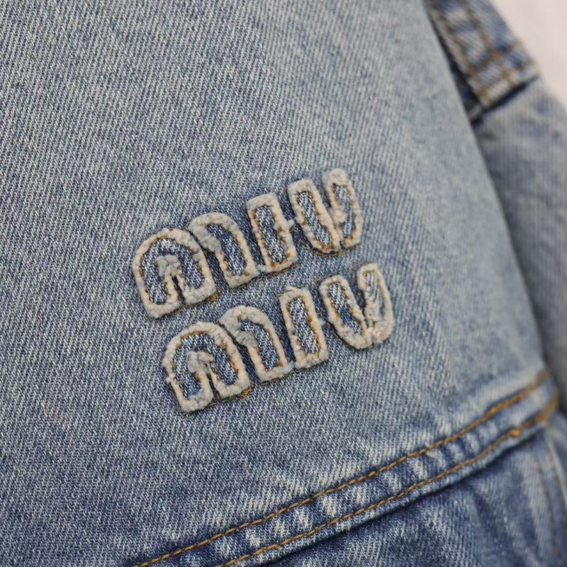 M*um*u washed denim jacket