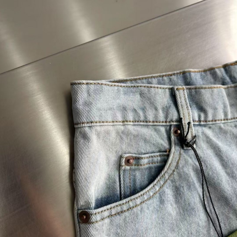 G*u*i cuffed washed jeans