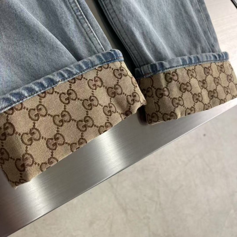 G*u*i cuffed washed jeans