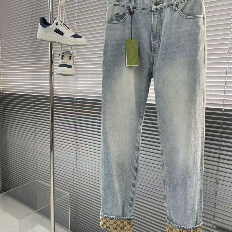 G*u*i cuffed washed jeans