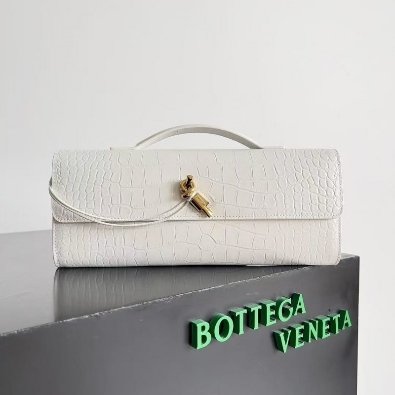 BOTTECA Ve*ne*ta uses exquisite craftsmanship intreccio embossed imported cow leather evening clutch b