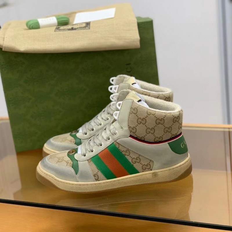 G*u*i High-top Distressed sneakers