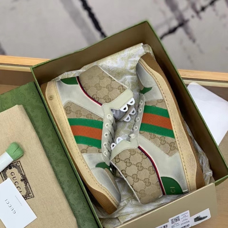 G*u*i High-top Distressed sneakers