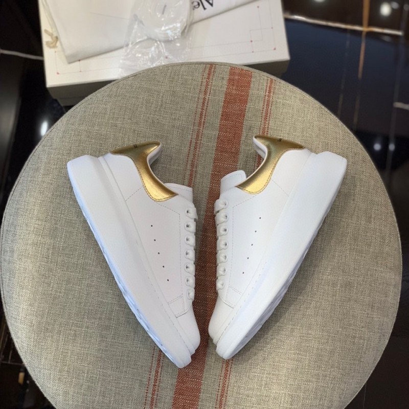 Ale*d*r M*Q*en MQ Gold cowhide tail Sneakers