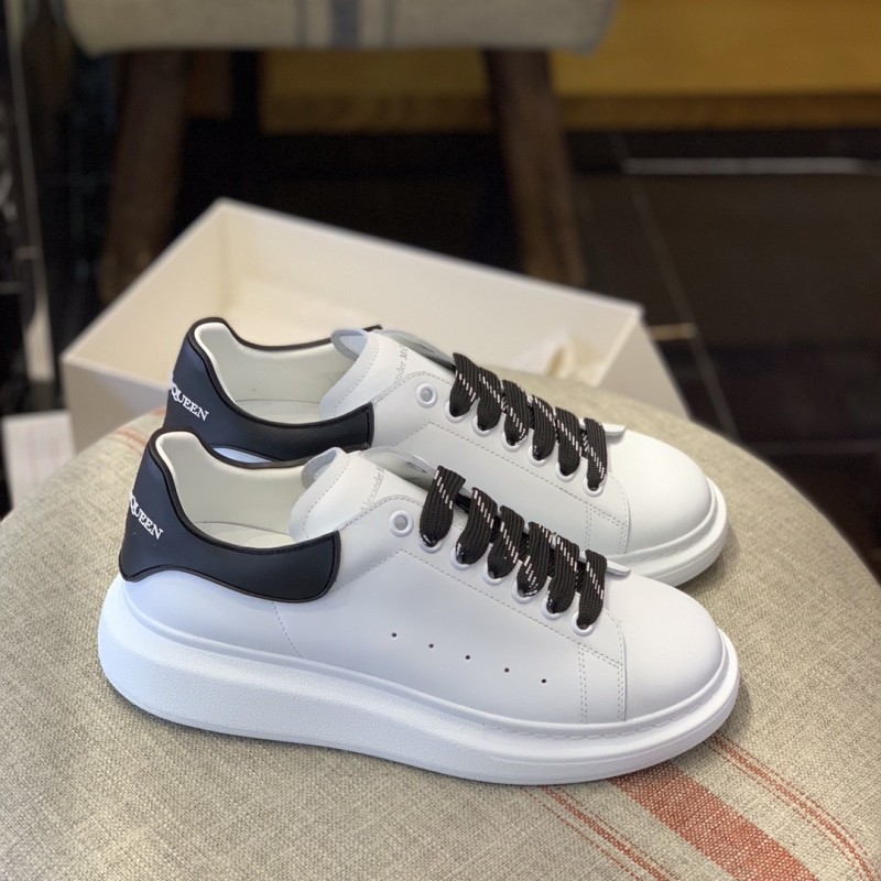 Ale*d*r M*Q*en MQ Black film tail Sneakers