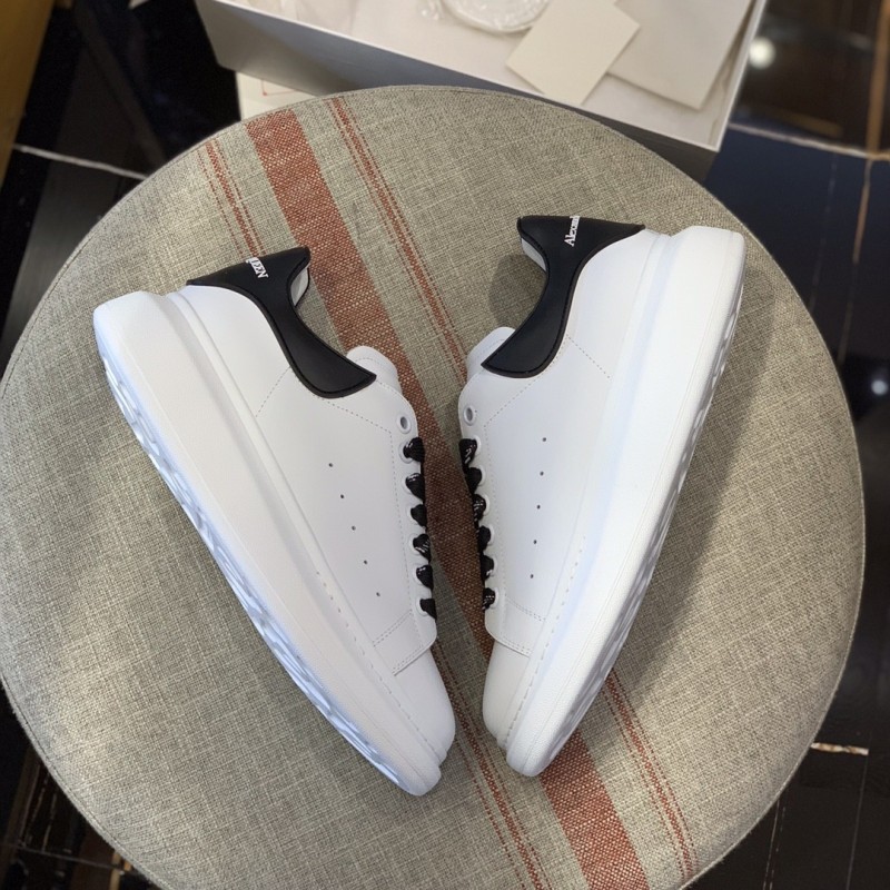 Ale*d*r M*Q*en MQ Black film tail Sneakers