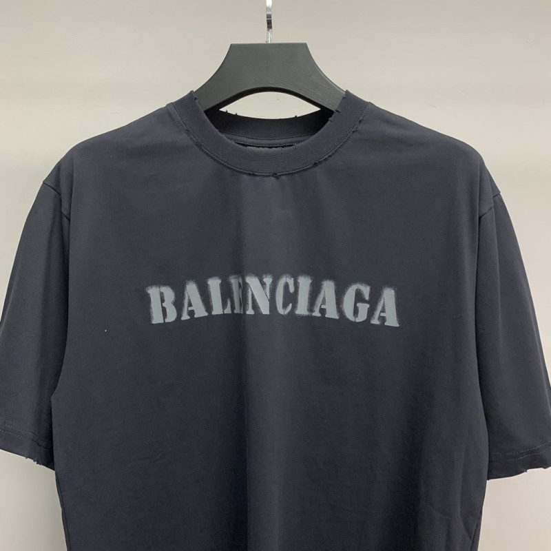 Ba*len*cia*ga front and back T-shirt with blurred letters