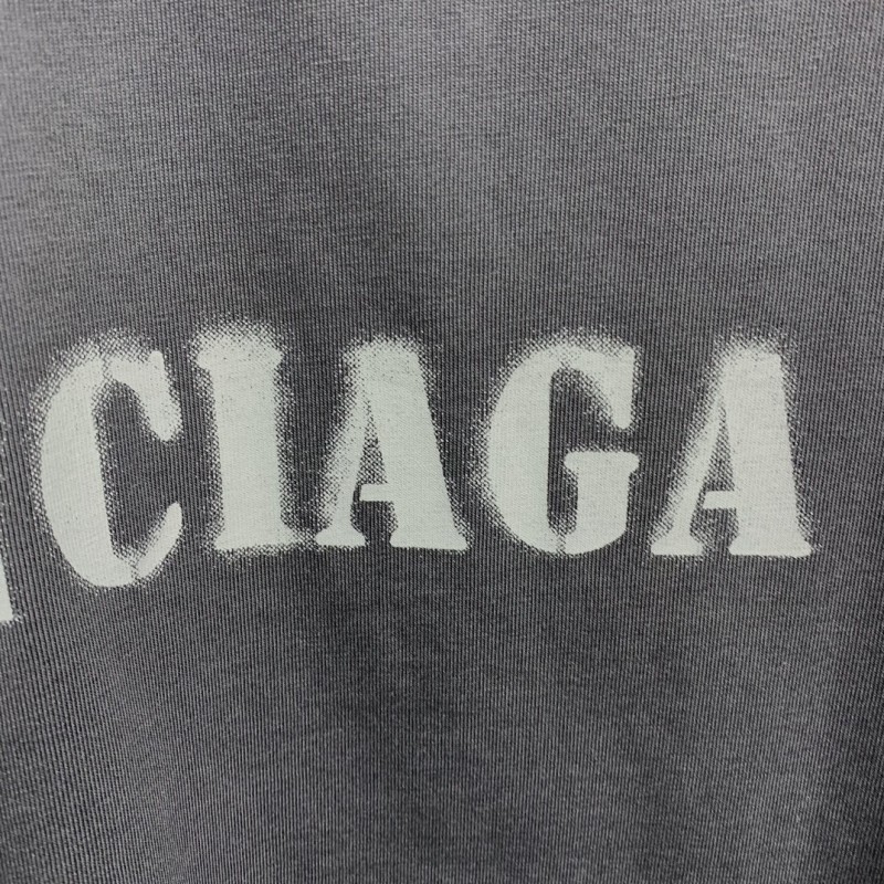 Ba*len*cia*ga front and back T-shirt with blurred letters