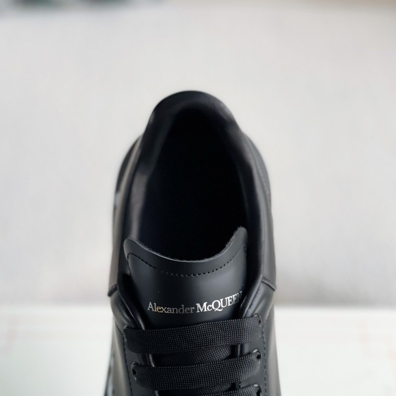 Ale*d*r M*Q*en black letter Sneakers