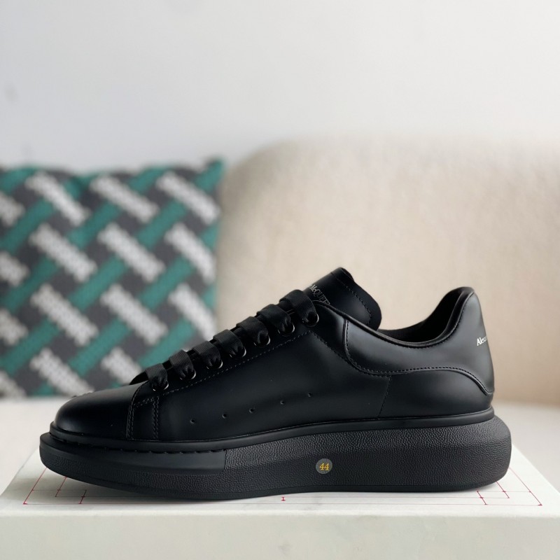 Ale*d*r M*Q*en black letter Sneakers