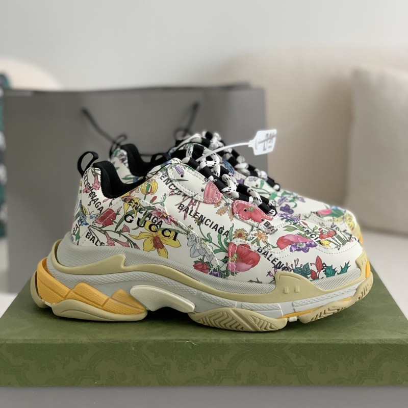 G*u*i X Ba*len*cia*ga Triple S Sneakers