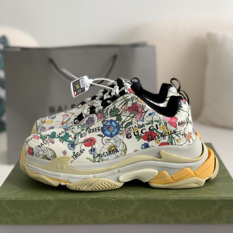 G*u*i X Ba*len*cia*ga Triple S Sneakers