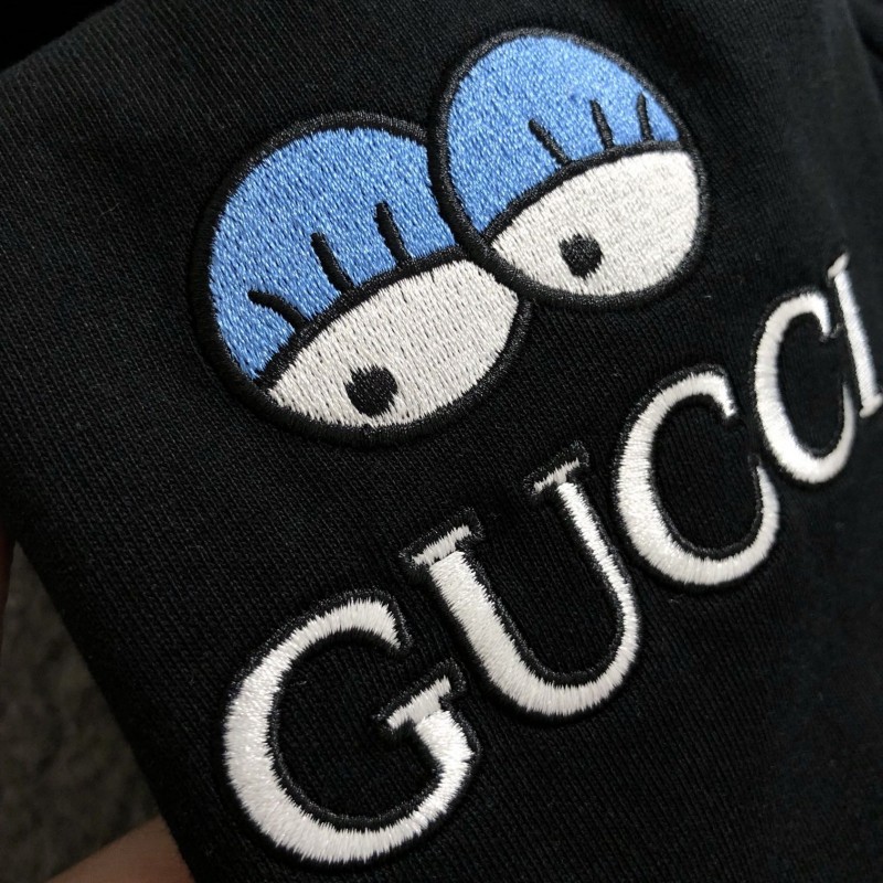 G*u*i Floral neckline embroidered polo shirt with cartoon lettering